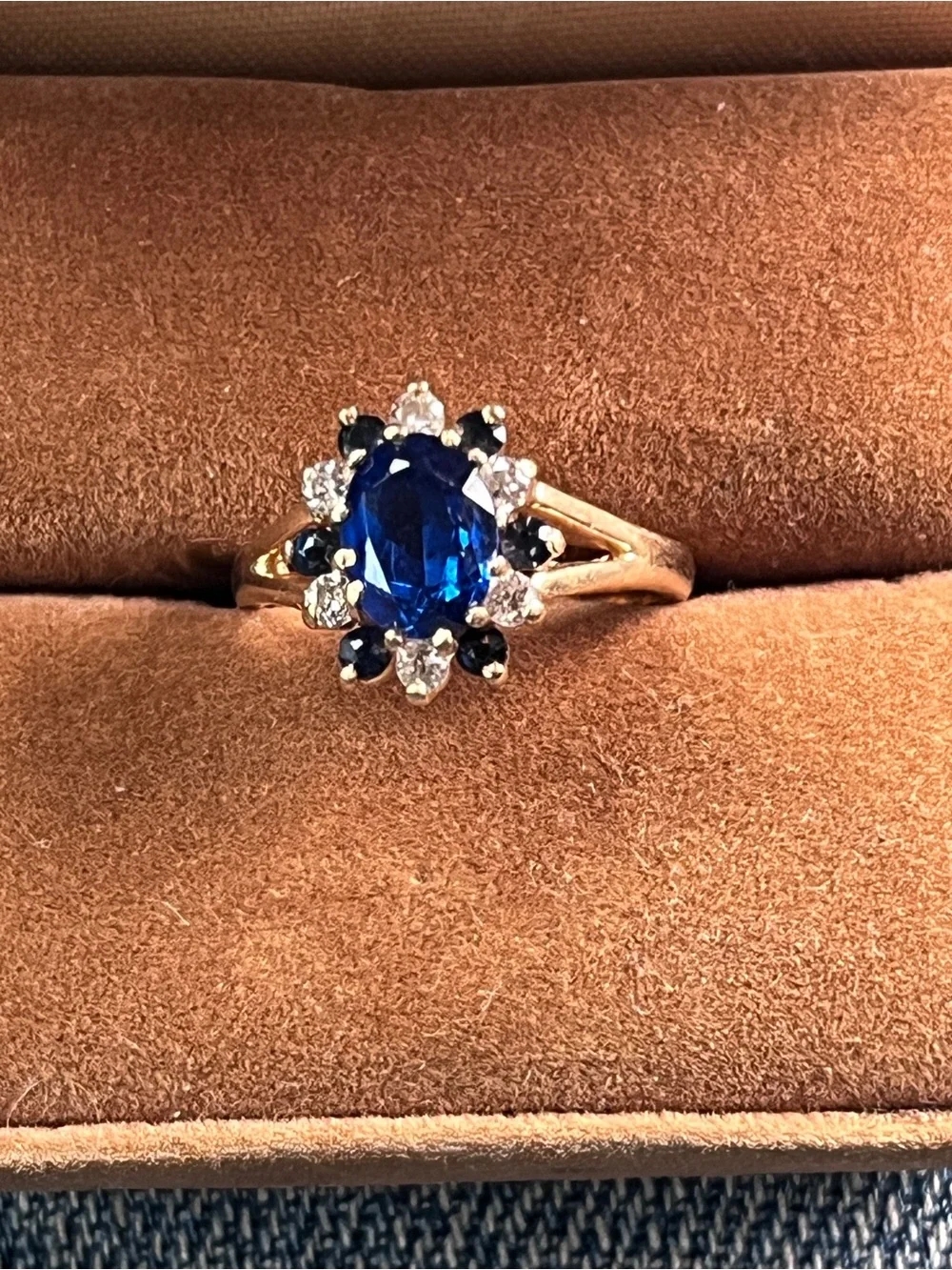 Blue Sapphire Halo Ring in Yellow Gold